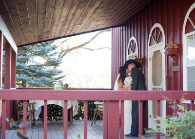 wedding kiss front porch Rough and Ready guest house