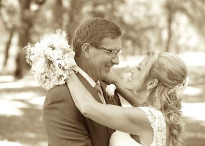 Sepia photo of couple in an intimate wedding venue setting