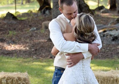 Couple Embrace at an Intimate Wedding Venue