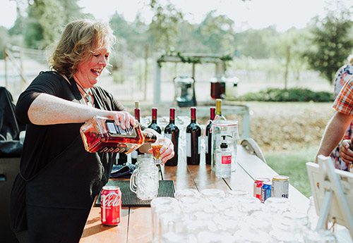 Athena Kalindi Photography took this photo of a bartender at the Rough & Ready Vineyards