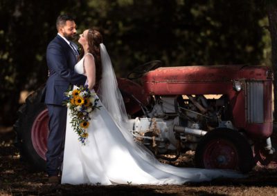 Bride and Groom with Antique Farm Equipment