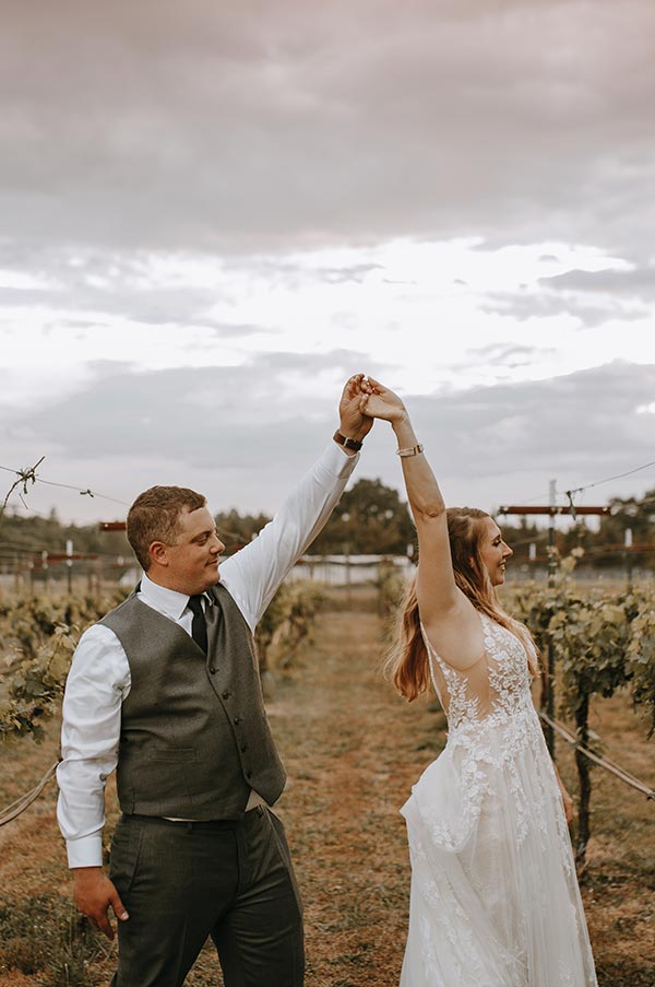 Megan & Logan in vineyard