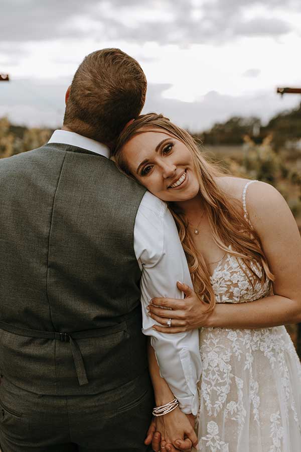 Megan smiling, Logan back to camera