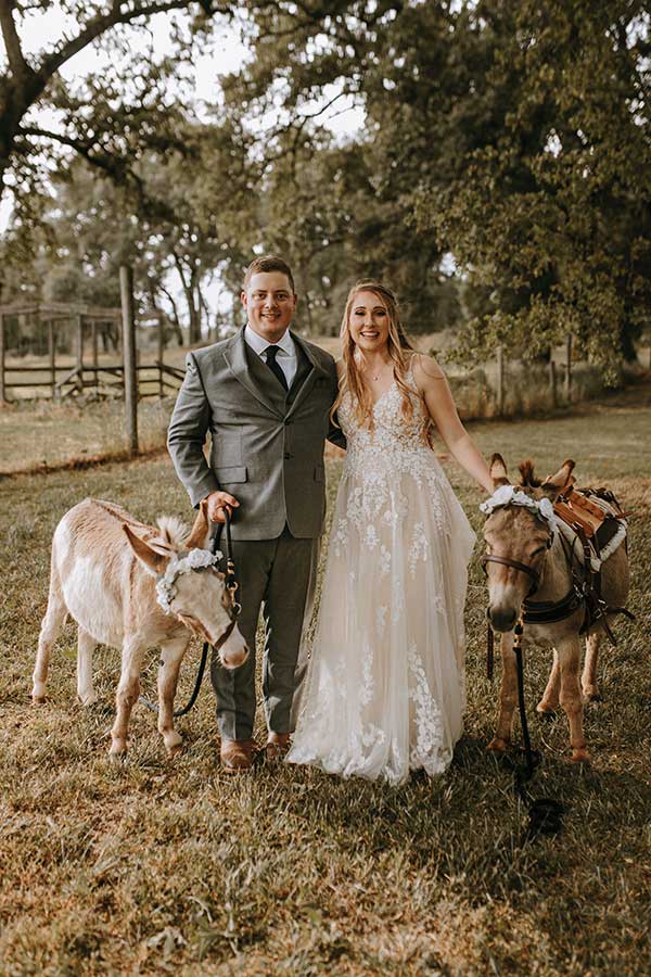 Megan & Logan Smiling with burros