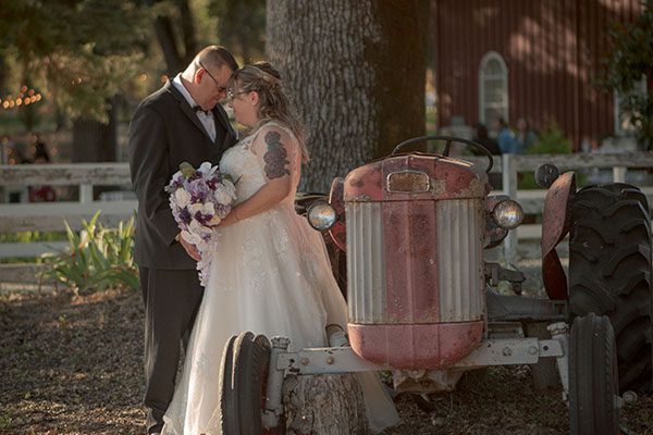 Bride and Groom Next To Tractor 2