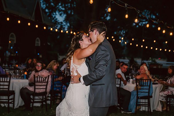 Nighttime bride and groom first dance