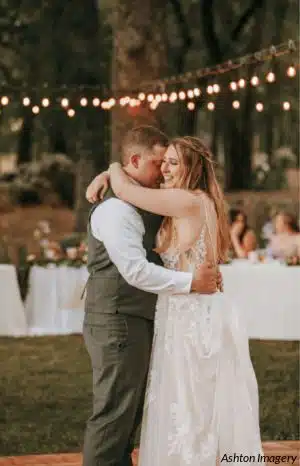 A bride and groom having their first dance at the Rough & Ready Vineyards. Photo by Ashton Imagery.