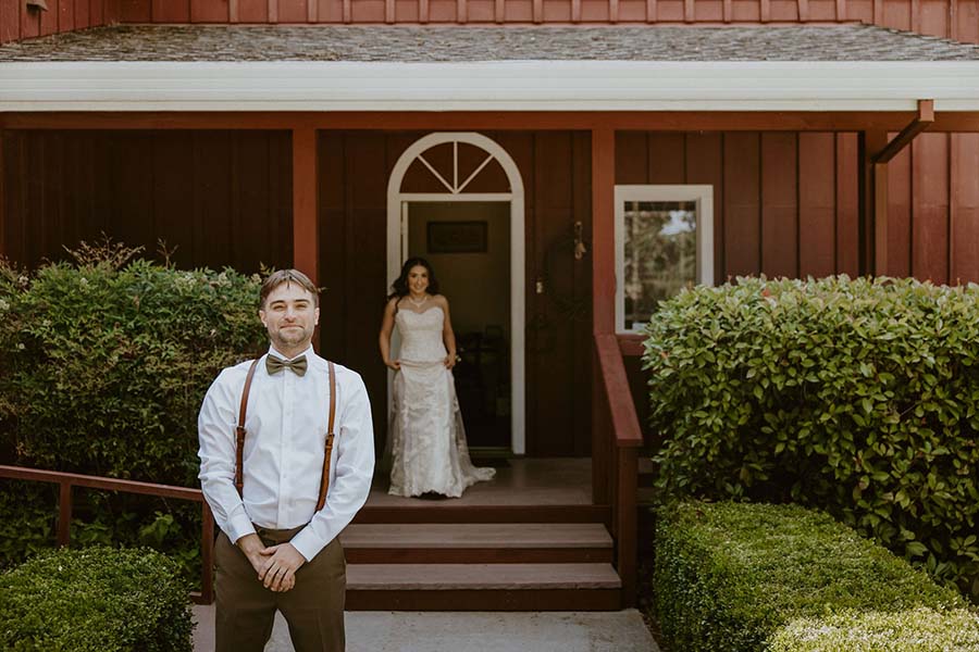 Couple in front of guesthouse