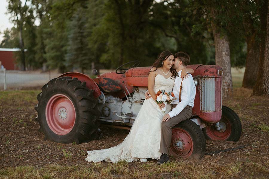 Couple sitting on tractor