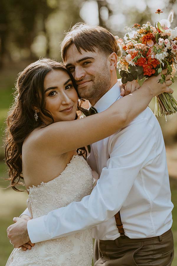 Arielle and Dustin smiling at camera