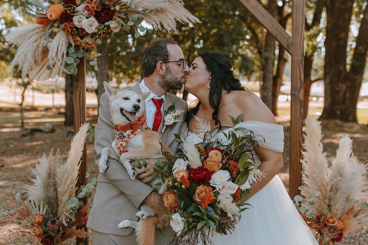 Teressa and Jannis celebrate their wedding with their dog joining in on the love