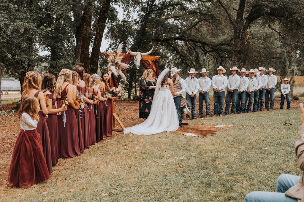 Shelby Ryan wedding party lined up for ceremony