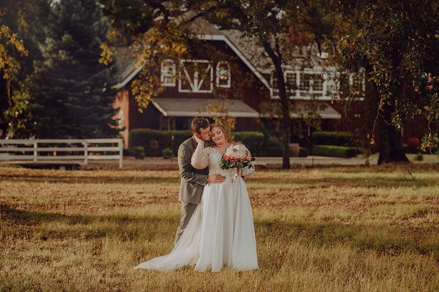 featured wedding Shelby and Bennett together in front of Rough and Ready