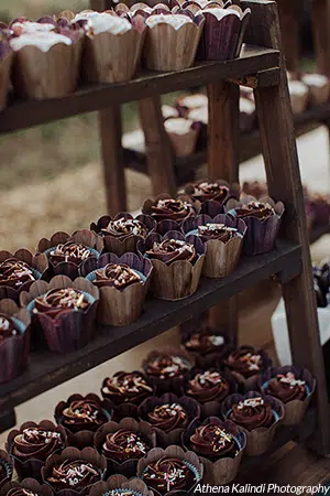Delicious cupcake tower at a Rough & Ready Vineyards wedding. Photo by Athena Kalindi