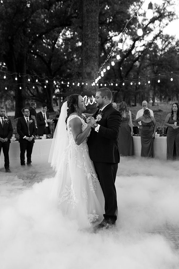 Featured wedding couple dance together