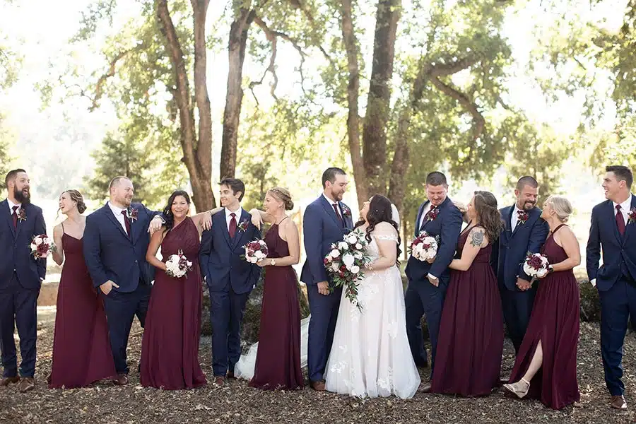 Brooke and Brandon having fun with their wedding party
