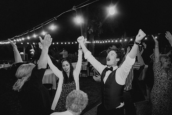Guests celebrating and dancing. Photo by Bryan Gallagher Photography