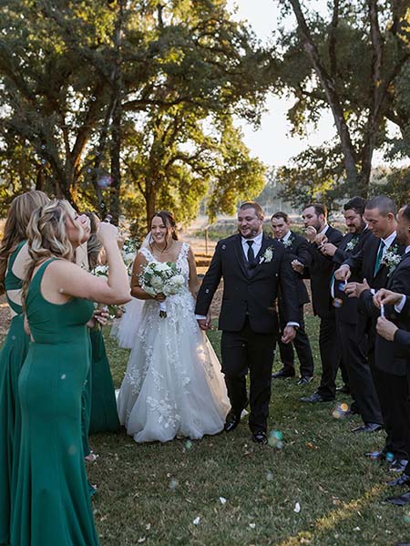 Wedding recessional with bubbles. Photo by Elizabeth Jane Photography