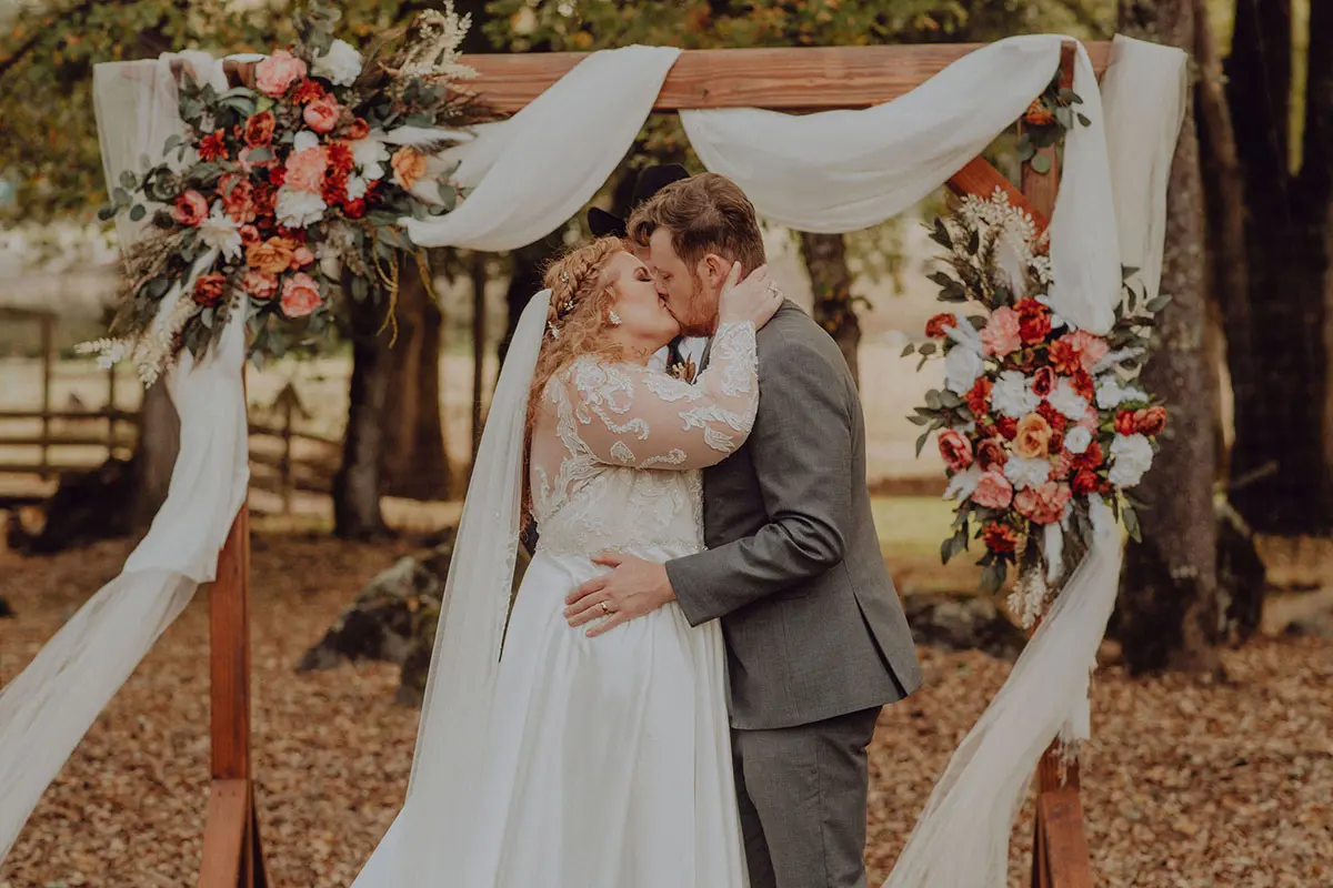 Bride and groom grand entrance wooden arch