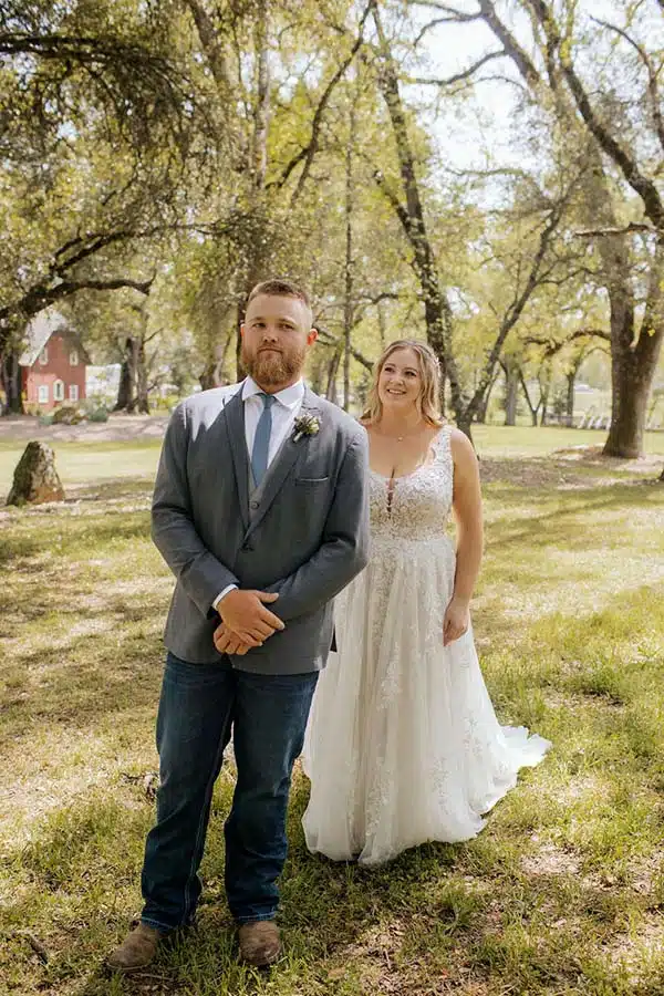 first-look-dt The bride and groom pose for their "first look" photo