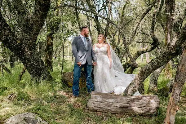 trees-dt Danielle and Timothy pose by Heritage Oak trees