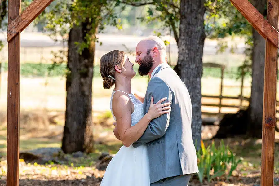 RebeccaTyler_0314 wedding couple embrace