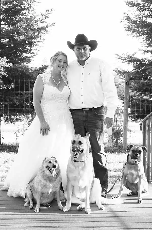 RondaMichaelAndDogs Bride and groom with dogs at August wedding