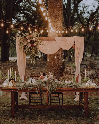 Bride and groom's table awaits the happy couple. Photo by Dream Capture Studios.