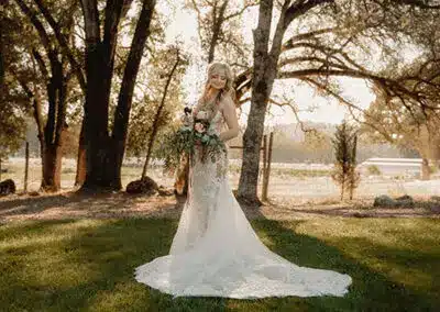 Maddy posing for a wedding portrait. Photo by Dream Capture Studios