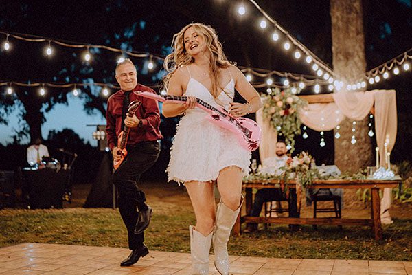 Maddy performs a choreographed routine with her dad. Photo by Dream Capture Studios