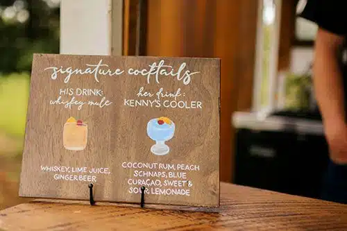 Board showing the bride and groom's signature cocktails. Photo by Taylor Benedickt Photography