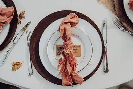 colorful table setting at wedding reception