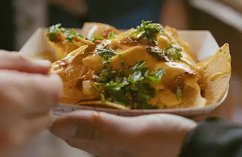Close up of nachos at a wedding. Photo by Heidi Peinthor Photography