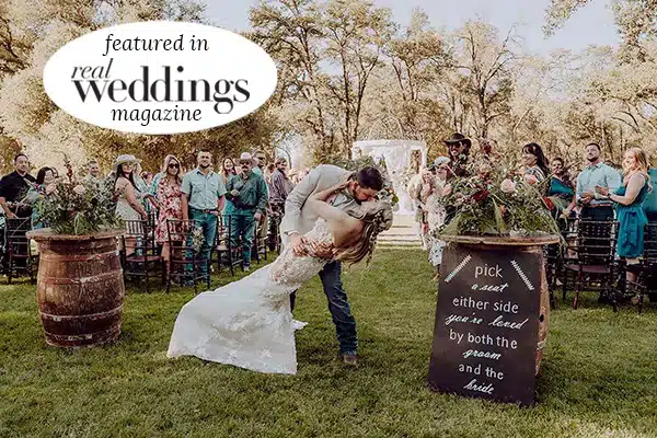ceremony-km_FeaturedPage Kasey and Maddy kiss at the end of the aisle. Photo by Dream Capture Studios