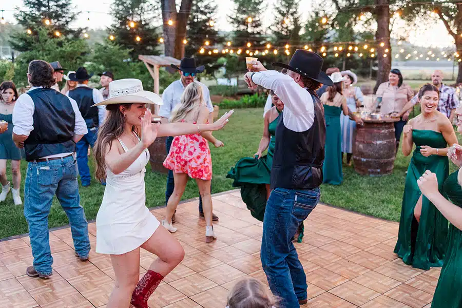dancing-kt Kaylee and Tuff having fun on the dance floor with their wedding guests