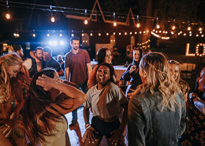 Wedding guests letting loose on the dance floor at Rough & Ready Vineyards. photo by Ashton Imagery