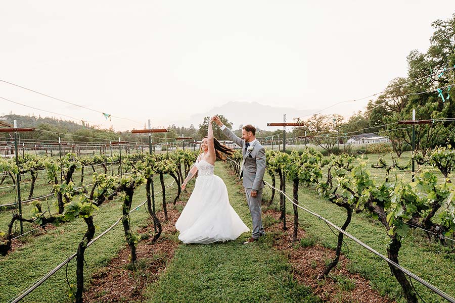2025-05-03-191841-640A7766 bride and groom in vineyard