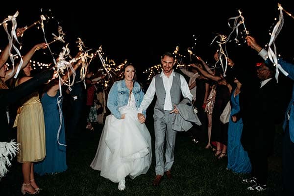 2025-05-03-220800-9Y1A0339-2 couple walking through market lights