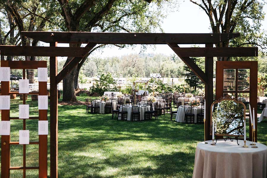 6X9A1876 wooden arch with reception area behind